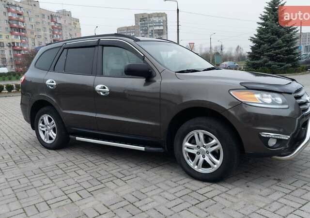 Коричневий Хендай Санта Фе, об'ємом двигуна 2.36 л та пробігом 270 тис. км за 12300 $, фото 9 на Automoto.ua