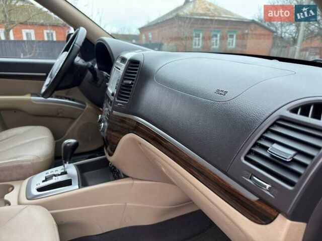 Коричневий Хендай Санта Фе, об'ємом двигуна 2.4 л та пробігом 160 тис. км за 10980 $, фото 40 на Automoto.ua