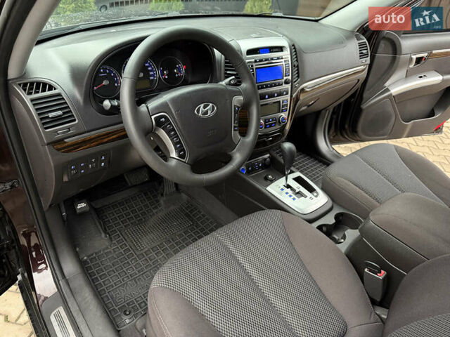 Коричневый Хендай Санта Фе, объемом двигателя 2.36 л и пробегом 195 тыс. км за 11900 $, фото 10 на Automoto.ua