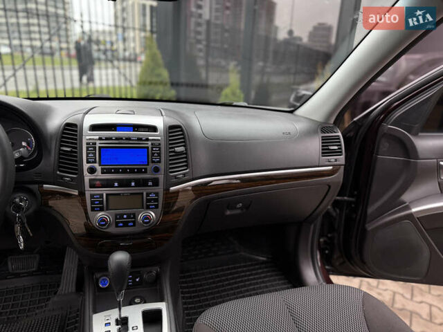 Коричневый Хендай Санта Фе, объемом двигателя 2.36 л и пробегом 195 тыс. км за 11900 $, фото 28 на Automoto.ua