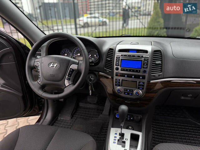 Коричневый Хендай Санта Фе, объемом двигателя 2.36 л и пробегом 195 тыс. км за 11900 $, фото 27 на Automoto.ua
