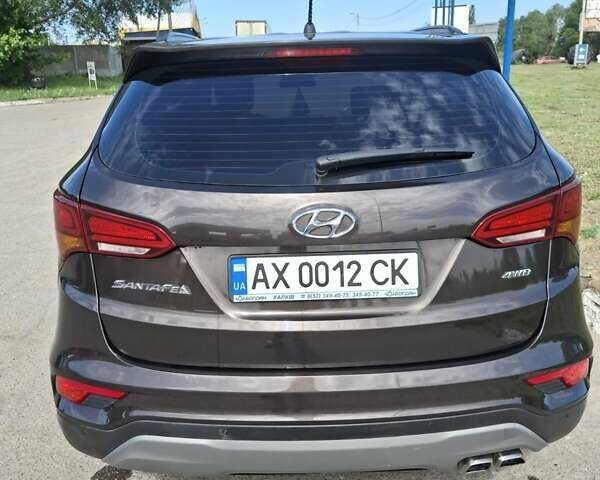 Коричневый Хендай Санта Фе, объемом двигателя 2.36 л и пробегом 102 тыс. км за 18900 $, фото 4 на Automoto.ua