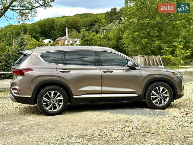 Коричневый Хендай Санта Фе, объемом двигателя 2.36 л и пробегом 80 тыс. км за 25400 $, фото 6 на Automoto.ua