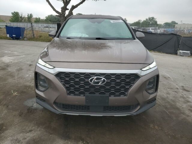 Коричневый Хендай Санта Фе, объемом двигателя 2.4 л и пробегом 131 тыс. км за 15700 $, фото 1 на Automoto.ua