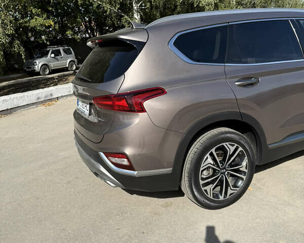 Коричневый Хендай Санта Фе, объемом двигателя 2 л и пробегом 50 тыс. км за 27200 $, фото 2 на Automoto.ua