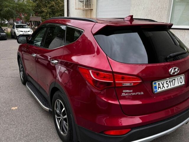 Красный Хендай Санта Фе, объемом двигателя 2 л и пробегом 166 тыс. км за 13000 $, фото 1 на Automoto.ua