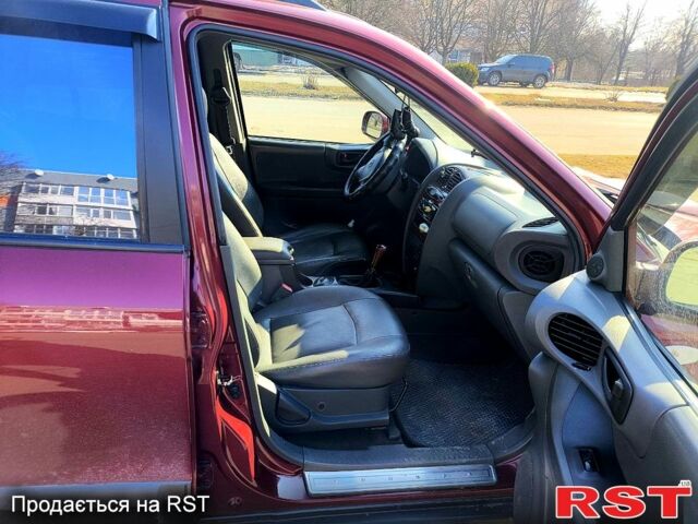 Красный Хендай Санта Фе, объемом двигателя 2 л и пробегом 280 тыс. км за 6200 $, фото 2 на Automoto.ua