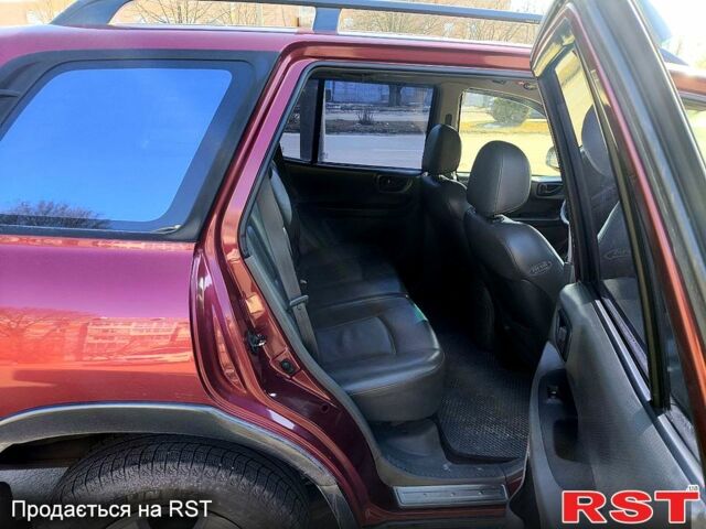 Красный Хендай Санта Фе, объемом двигателя 2 л и пробегом 280 тыс. км за 6200 $, фото 1 на Automoto.ua