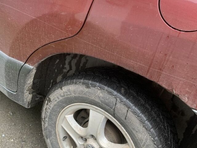 Красный Хендай Санта Фе, объемом двигателя 2 л и пробегом 400 тыс. км за 3300 $, фото 4 на Automoto.ua