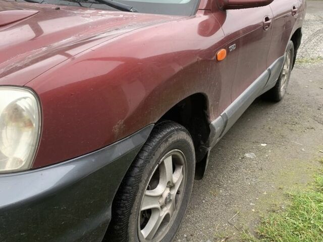 Красный Хендай Санта Фе, объемом двигателя 2 л и пробегом 400 тыс. км за 3300 $, фото 2 на Automoto.ua