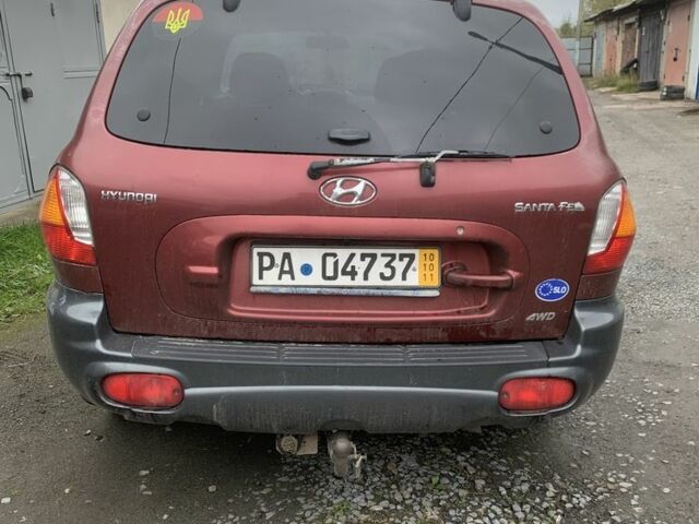 Красный Хендай Санта Фе, объемом двигателя 2 л и пробегом 400 тыс. км за 3300 $, фото 1 на Automoto.ua