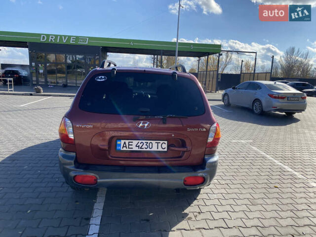 Красный Хендай Санта Фе, объемом двигателя 2.4 л и пробегом 256 тыс. км за 4000 $, фото 4 на Automoto.ua