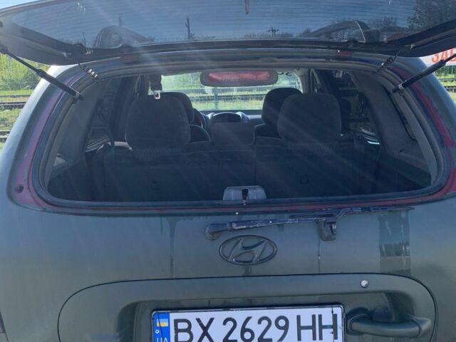 Красный Хендай Санта Фе, объемом двигателя 2.4 л и пробегом 267 тыс. км за 3200 $, фото 7 на Automoto.ua