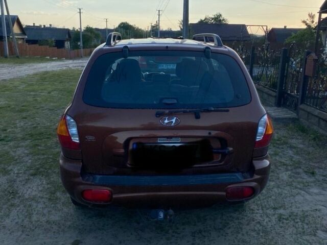 Красный Хендай Санта Фе, объемом двигателя 2 л и пробегом 320 тыс. км за 2300 $, фото 5 на Automoto.ua