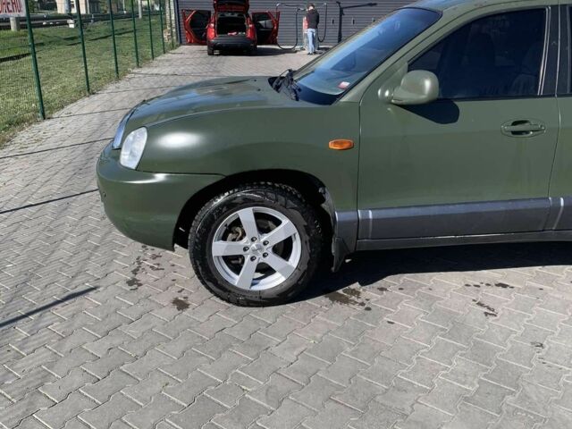 Красный Хендай Санта Фе, объемом двигателя 2.4 л и пробегом 267 тыс. км за 3200 $, фото 1 на Automoto.ua