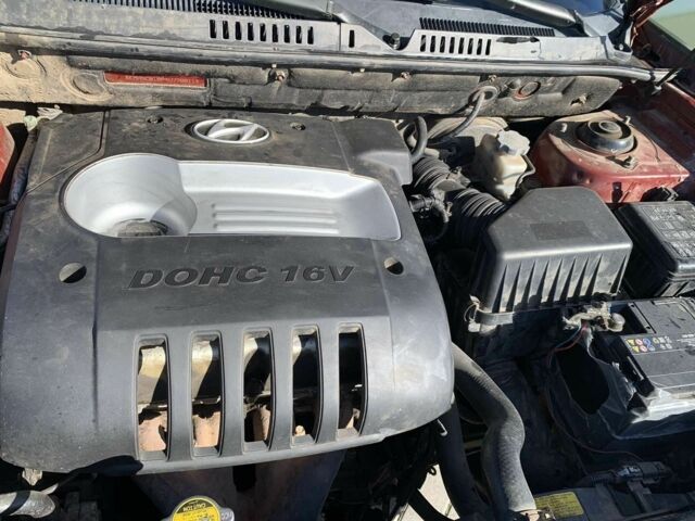 Красный Хендай Санта Фе, объемом двигателя 2.4 л и пробегом 267 тыс. км за 3200 $, фото 11 на Automoto.ua