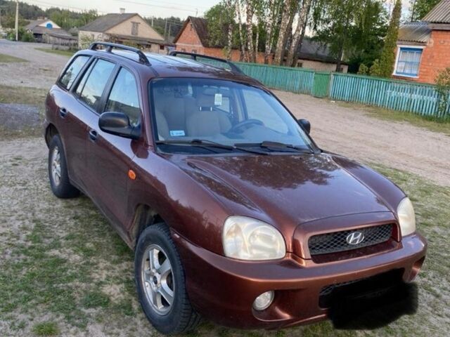 Красный Хендай Санта Фе, объемом двигателя 2 л и пробегом 320 тыс. км за 2300 $, фото 4 на Automoto.ua