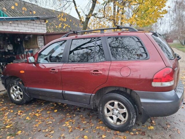 Красный Хендай Санта Фе, объемом двигателя 2 л и пробегом 120 тыс. км за 8500 $, фото 1 на Automoto.ua