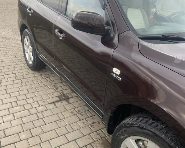 Красный Хендай Санта Фе, объемом двигателя 2.19 л и пробегом 200 тыс. км за 9000 $, фото 6 на Automoto.ua