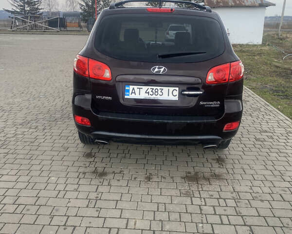 Красный Хендай Санта Фе, объемом двигателя 2.19 л и пробегом 200 тыс. км за 9000 $, фото 3 на Automoto.ua