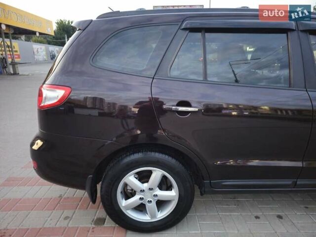 Красный Хендай Санта Фе, объемом двигателя 2.2 л и пробегом 137 тыс. км за 10500 $, фото 1 на Automoto.ua