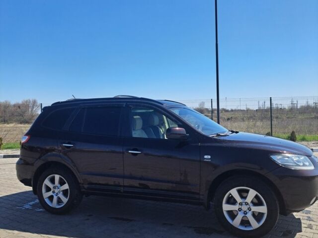 Красный Хендай Санта Фе, объемом двигателя 2.7 л и пробегом 185 тыс. км за 9700 $, фото 3 на Automoto.ua