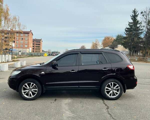 Красный Хендай Санта Фе, объемом двигателя 2.19 л и пробегом 182 тыс. км за 9800 $, фото 2 на Automoto.ua