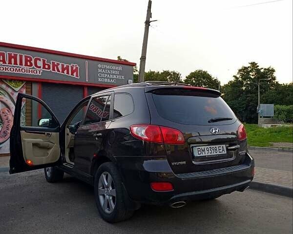 Красный Хендай Санта Фе, объемом двигателя 2.66 л и пробегом 312 тыс. км за 10000 $, фото 5 на Automoto.ua