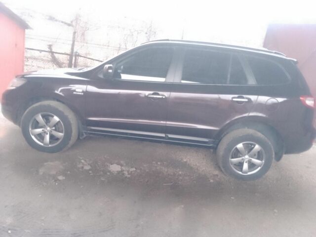 Красный Хендай Санта Фе, объемом двигателя 2.7 л и пробегом 125 тыс. км за 9700 $, фото 1 на Automoto.ua