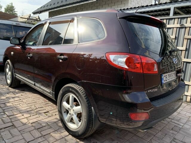 Красный Хендай Санта Фе, объемом двигателя 2.2 л и пробегом 257 тыс. км за 10000 $, фото 1 на Automoto.ua