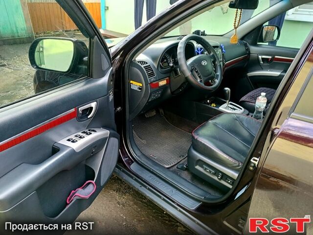 Красный Хендай Санта Фе, объемом двигателя 2.2 л и пробегом 240 тыс. км за 9600 $, фото 4 на Automoto.ua