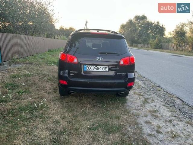 Красный Хендай Санта Фе, объемом двигателя 2.66 л и пробегом 340 тыс. км за 7899 $, фото 2 на Automoto.ua