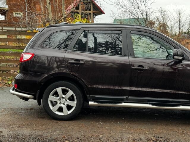 Красный Хендай Санта Фе, объемом двигателя 2.2 л и пробегом 331 тыс. км за 10490 $, фото 4 на Automoto.ua