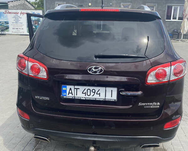 Красный Хендай Санта Фе, объемом двигателя 2.2 л и пробегом 190 тыс. км за 11499 $, фото 2 на Automoto.ua