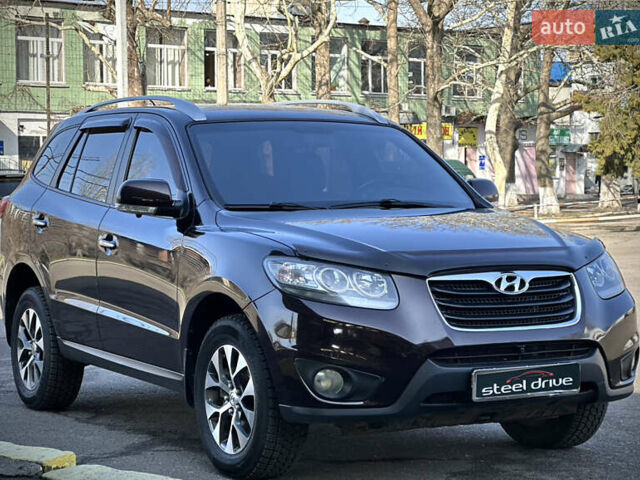 Красный Хендай Санта Фе, объемом двигателя 2.2 л и пробегом 242 тыс. км за 12999 $, фото 1 на Automoto.ua