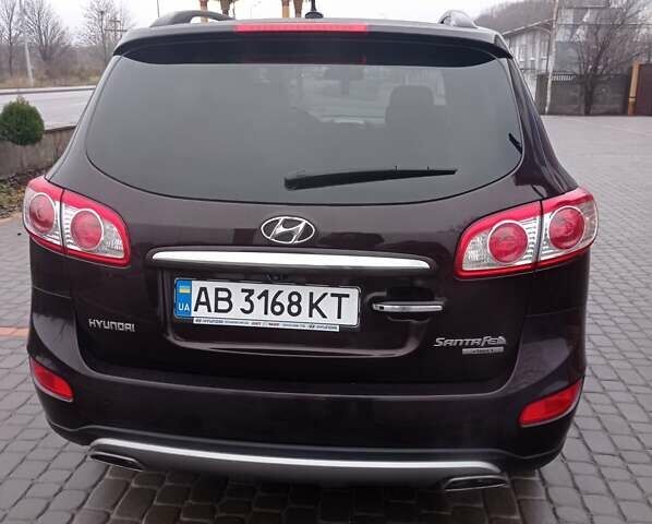 Красный Хендай Санта Фе, объемом двигателя 2.36 л и пробегом 204 тыс. км за 13600 $, фото 3 на Automoto.ua