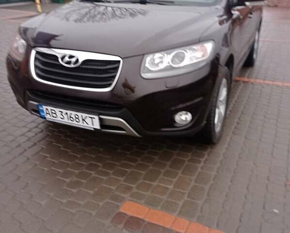 Красный Хендай Санта Фе, объемом двигателя 2.36 л и пробегом 204 тыс. км за 13600 $, фото 4 на Automoto.ua