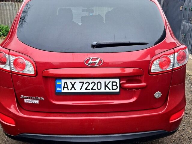 Червоний Хендай Санта Фе, об'ємом двигуна 2.4 л та пробігом 210 тис. км за 12000 $, фото 2 на Automoto.ua