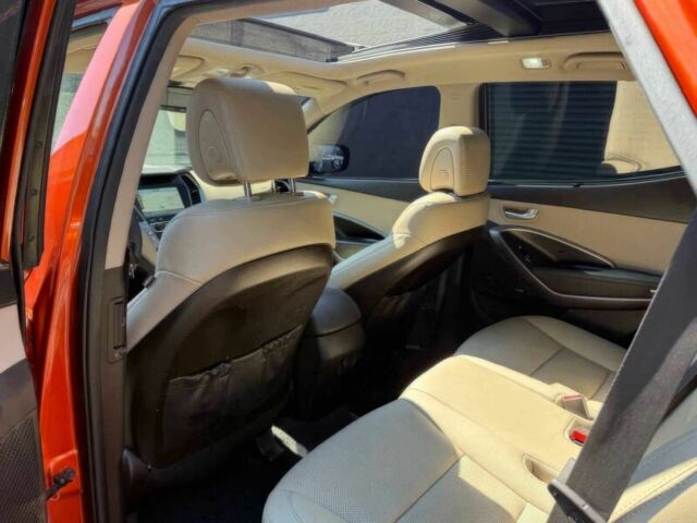 Красный Хендай Санта Фе, объемом двигателя 2 л и пробегом 50 тыс. км за 12500 $, фото 15 на Automoto.ua