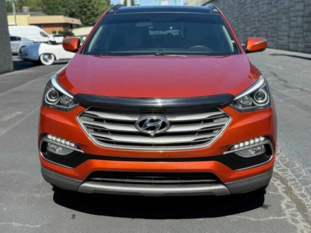 Красный Хендай Санта Фе, объемом двигателя 2 л и пробегом 50 тыс. км за 12500 $, фото 1 на Automoto.ua