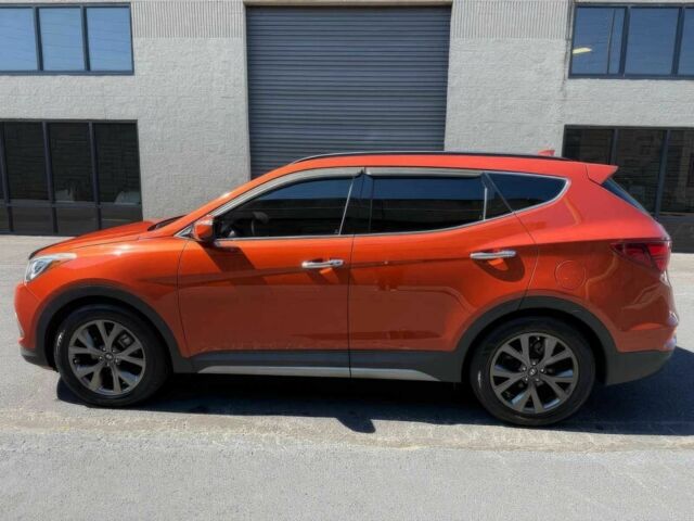 Красный Хендай Санта Фе, объемом двигателя 2 л и пробегом 50 тыс. км за 12500 $, фото 4 на Automoto.ua