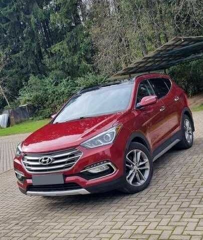 Красный Хендай Санта Фе, объемом двигателя 2 л и пробегом 57 тыс. км за 12500 $, фото 1 на Automoto.ua