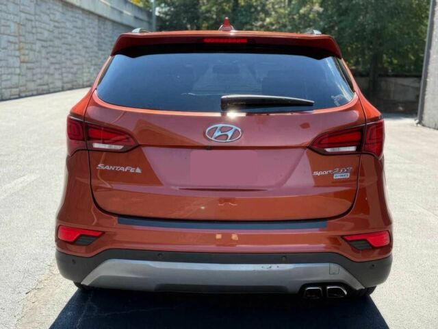 Красный Хендай Санта Фе, объемом двигателя 2 л и пробегом 50 тыс. км за 12500 $, фото 6 на Automoto.ua