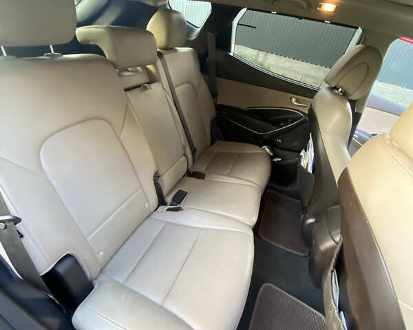 Красный Хендай Санта Фе, объемом двигателя 2.4 л и пробегом 102 тыс. км за 18550 $, фото 7 на Automoto.ua