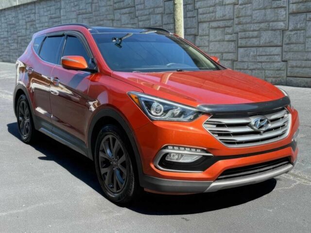 Красный Хендай Санта Фе, объемом двигателя 2 л и пробегом 50 тыс. км за 12500 $, фото 2 на Automoto.ua