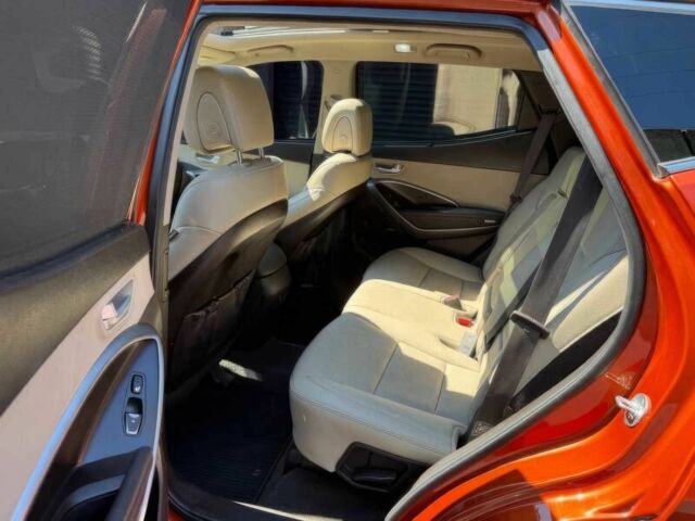 Красный Хендай Санта Фе, объемом двигателя 2 л и пробегом 50 тыс. км за 12500 $, фото 13 на Automoto.ua