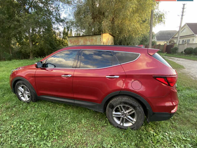 Красный Хендай Санта Фе, объемом двигателя 2.4 л и пробегом 102 тыс. км за 18550 $, фото 1 на Automoto.ua