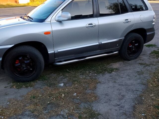 Хендай Санта Фе, объемом двигателя 2 л и пробегом 209 тыс. км за 7000 $, фото 2 на Automoto.ua