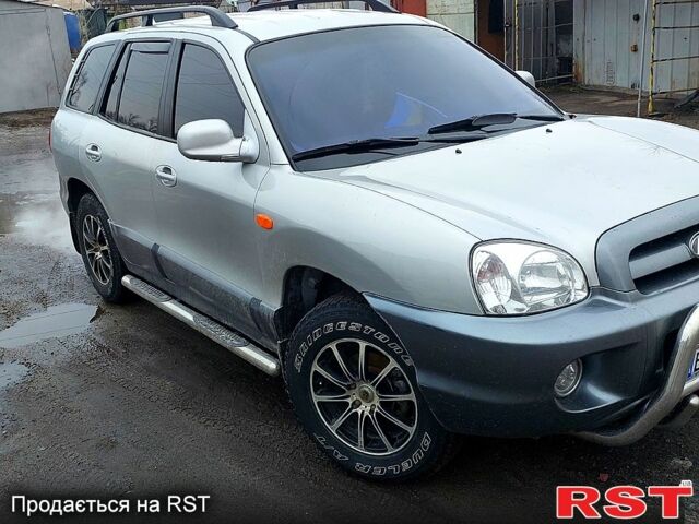 Хендай Санта Фе, объемом двигателя 2 л и пробегом 200 тыс. км за 7650 $, фото 2 на Automoto.ua