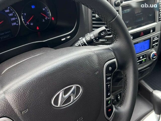 Хендай Санта Фе, объемом двигателя 2 л и пробегом 214 тыс. км за 13490 $, фото 18 на Automoto.ua